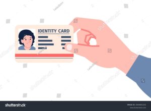 pessoa segurando carteira de trabalho e documento